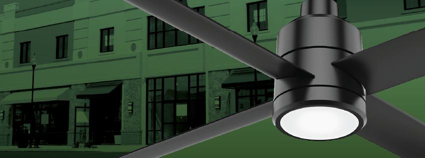 Trak Edge Commercial Fan with retail building in the background
